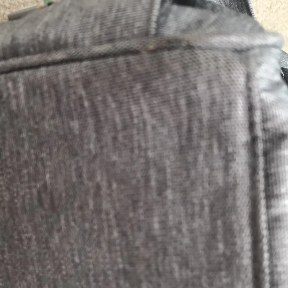 Baby changing gray backpack with multiple pockets
